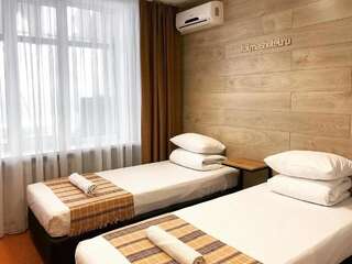 Гостиница Италмас Отель Ижевск Стандартный двухместный номер с 2 отдельными кроватями-3